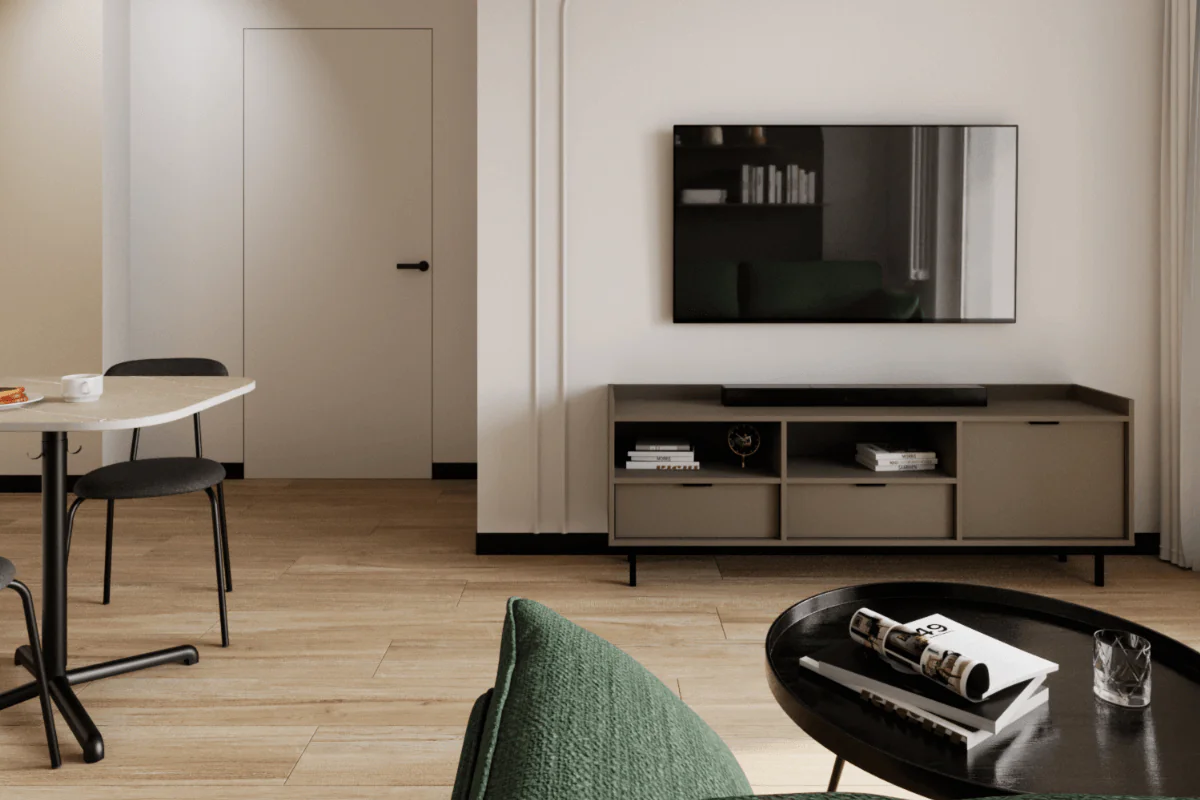 Salon w stylu minimalistycznym i współczesnym z zieloną kanapą i telewizorem