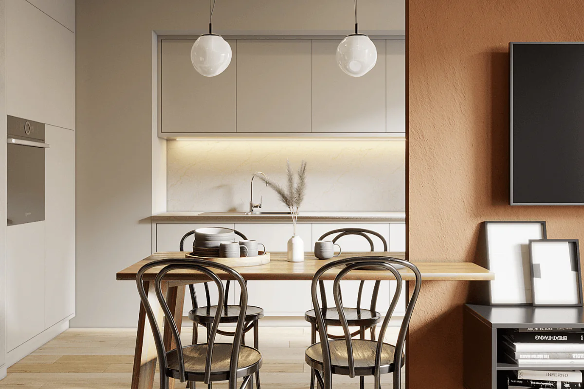 Współczesna kuchnia z drewnianym stołem i jasnymi szafkami.