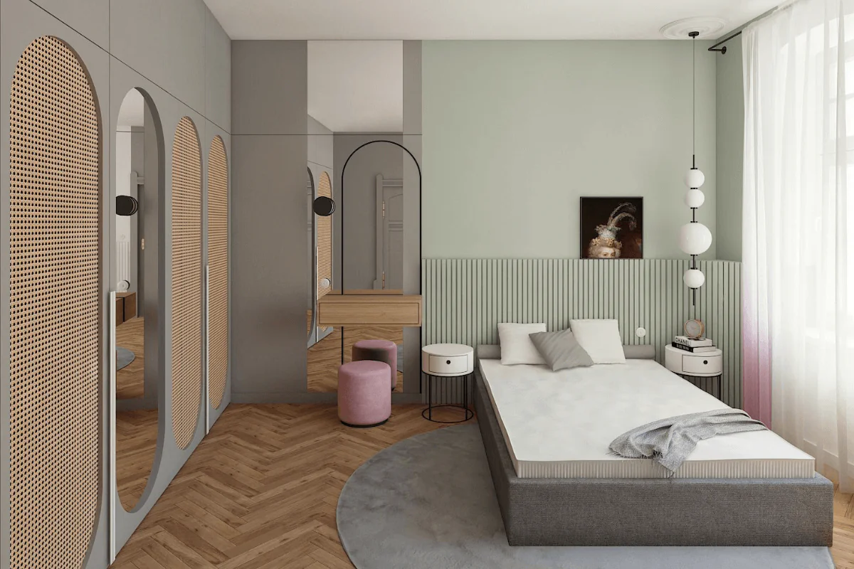 Sypialnia z szarym łóżkiem, różowymi pufami i drewnianą podłogą w stylu dopamine decor.