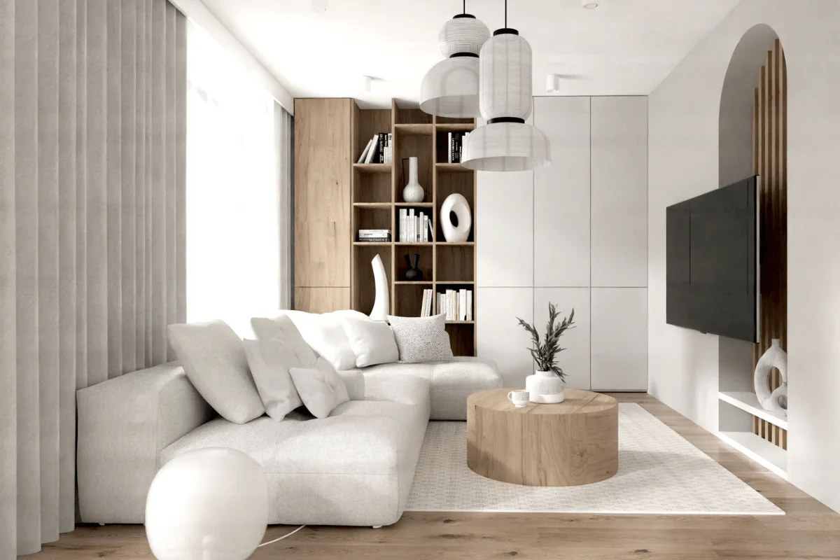 Wnętrze salonu w stylu japandi i skandynawskim z jasnymi meblami.
