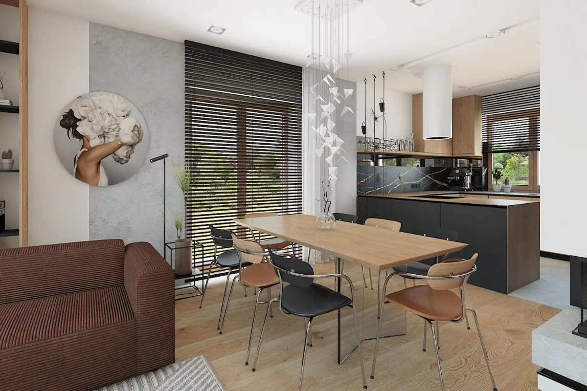 Wnętrze jadalni z drewnianym stołem, czarnymi krzesłami, minimalistycznym wystrojem i nowoczesnym oświetleniem.