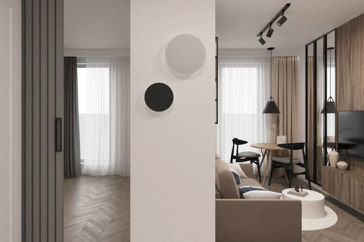 Wnętrze minimalistycznego salonu z jasnymi ścianami i drewnianymi meblami