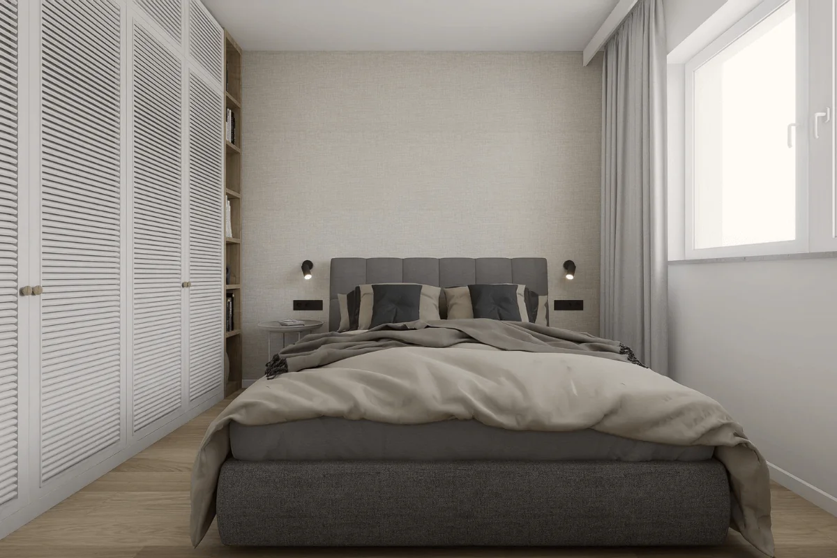 Sypialnia z szarym łóżkiem, białymi meblami i minimalistycznym wystrojem.