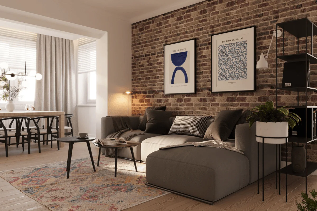 Wnętrze salonu w stylu eklektycznym z ceglaną ścianą i nowoczesnymi meblami.