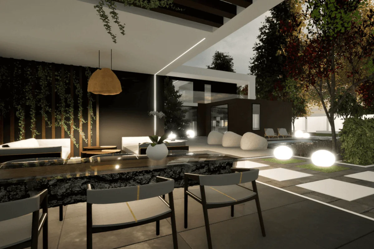 Wnętrze tarasu z drewnianym stołem, roślinami i nowoczesnym oświetleniem.