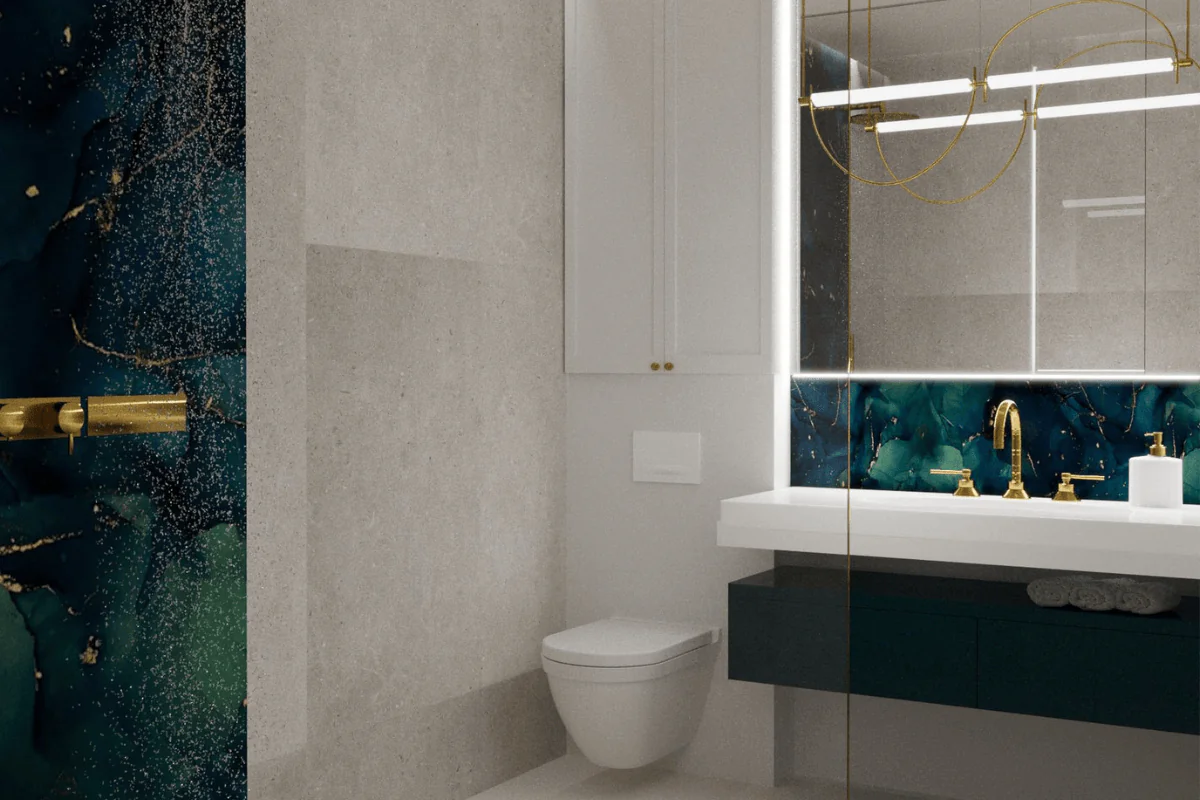 Nowoczesna łazienka z niebieską ścianą, złotymi detalami i minimalistycznym designem glamour.