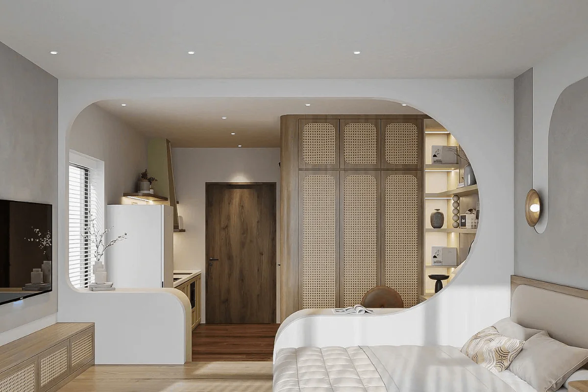 Wnętrze pokoju z elementami japandi i minimalistycznymi, białe meble, drewniane akcenty.