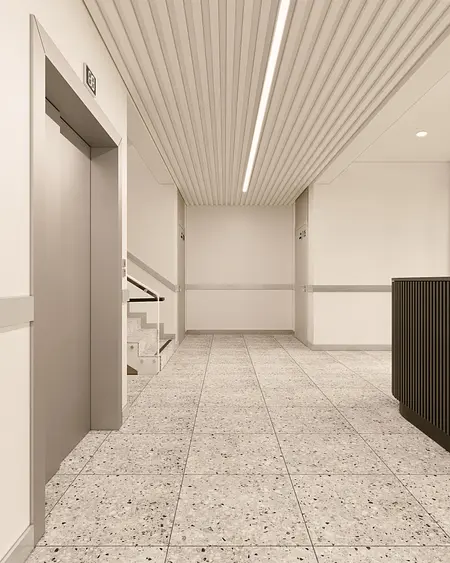 Korytarz z minimalistycznym wystrojem, nowoczesne ściany i podłoga w stylu soft minimalizm.