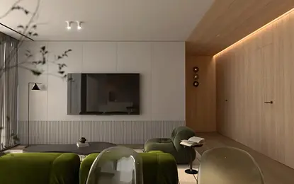 Wnętrze salonu w stylu minimalistycznym z zielonymi fotelami i drewnianymi elementami.