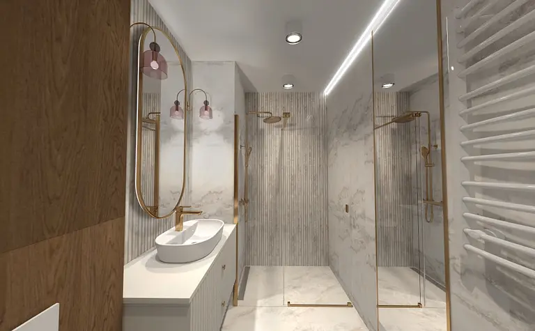 Nowoczesna łazienka z białą umywalką i złotymi detalami.