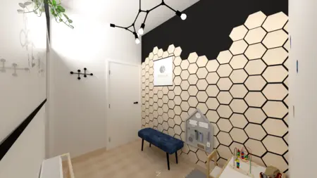 Wnętrze pokoju dziecięcego z hexagonalną ścianą, zabawkami i rośliną.