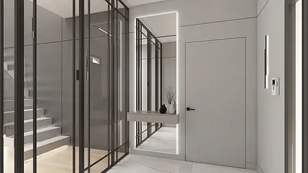 Nowoczesny przedpokój z szarymi ścianami i minimalistycznymi detalami.