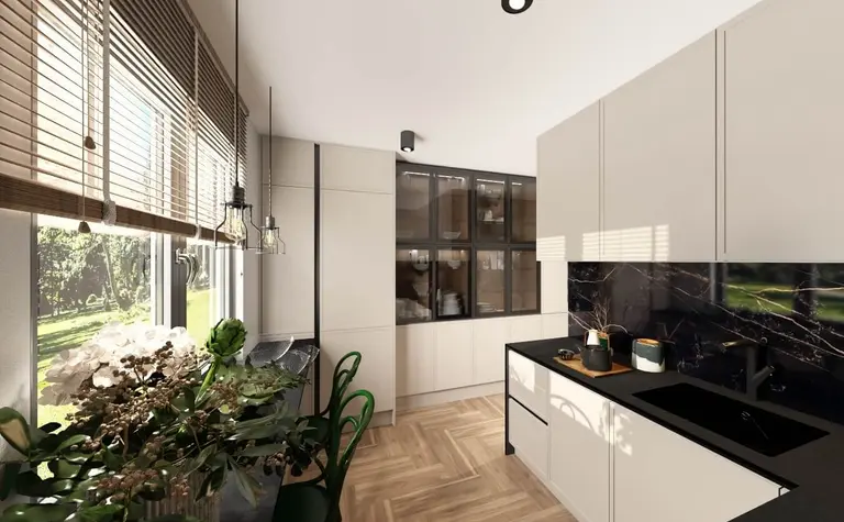 Kuchnia z beżowymi meblami, czarnym blatem i roślinami w stylu industrialnym, minimalistycznym, nowoczesnym.