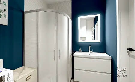 Współczesna łazienka z niebieskimi ścianami i białymi meblami.