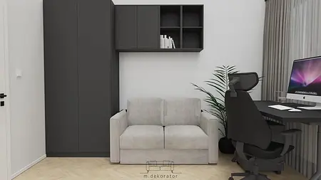 Wnętrze gabinetu z minimalistycznym biurkiem, szarą sofą i nowoczesnymi akcesoriami.