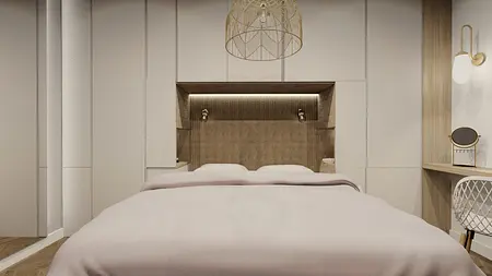 Sypialnia minimalistyczna z beżowym łóżkiem i drewnianymi detalami.