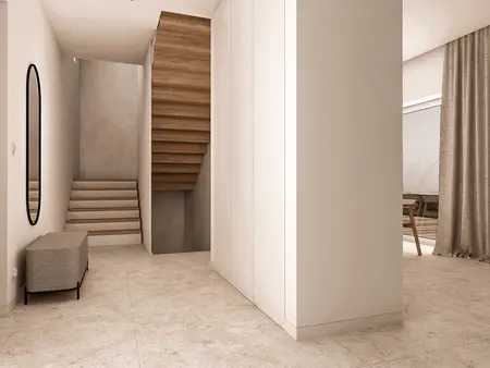 Przedpokój w stylu minimalistycznym z drewnianymi schodami, lustrem i jasnymi tonami.