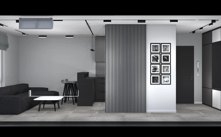 Wnętrze salonu z czarną sofą, szarymi ścianami i nowoczesnymi elementami art deco i minimalistycznymi.