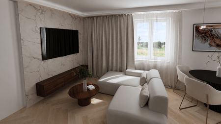 Wnętrze salonu w stylu japandi, minimalistycznym i skandynawskim z jasną sofą.
