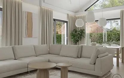 Wnętrze nowoczesnego salonu w stylu skandynawskim z jasnymi meblami i roślinnością.
