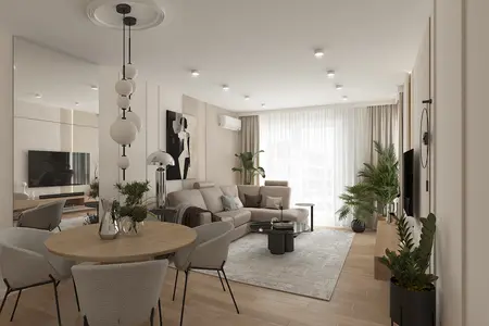 Wnętrze salonu w stylu minimaluxe z jasnymi meblami i roślinnością.