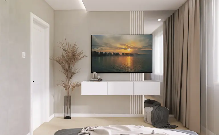 Nowoczesne wnętrze z białą szafką, telewizorem i rośliną.