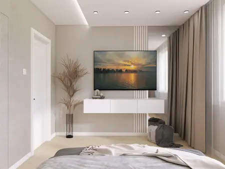Nowoczesne wnętrze z białą szafką, telewizorem i rośliną.