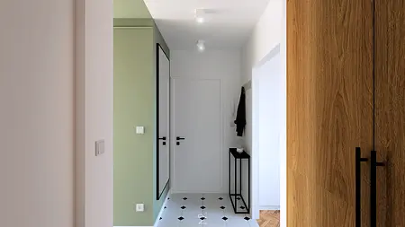Przedpokój w stylu boho i minimalistycznym z zieloną ścianą i czarno-białą podłogą.