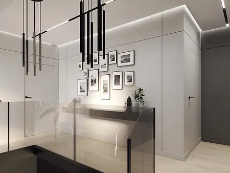 Nowoczesny przedpokój z minimalistycznym oświetleniem i dekoracjami.