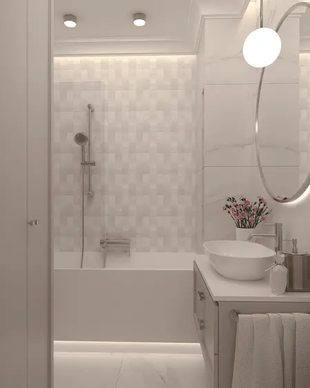 Nowoczesna łazienka z wanną, złotymi akcentami i kwiatami, styl quiet luxury.
