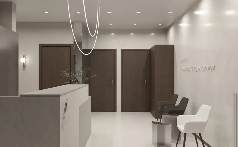 Recepcja w stylu eklektycznym z minimalistycznym wystrojem i nowoczesnym oświetleniem.