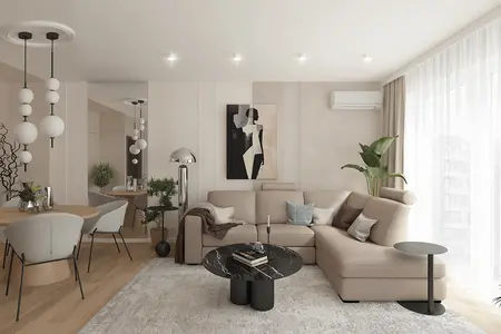 Wnętrze salonu w stylu minimaluxe z beżową sofą, czarnym stolikiem i dużymi oknami.
