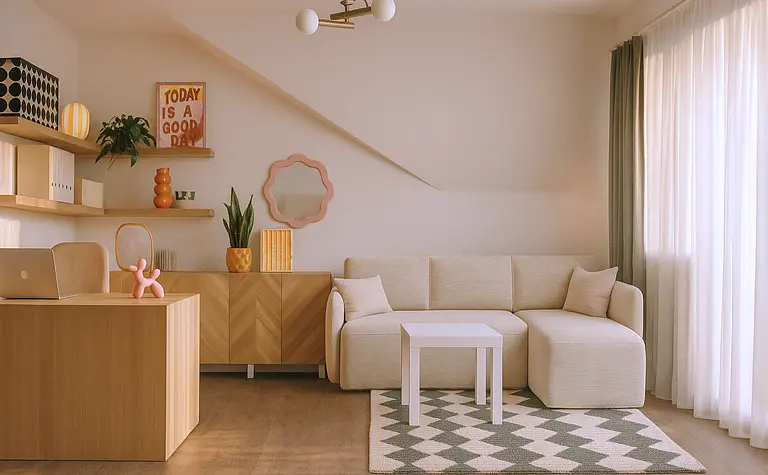 Stylowe wnętrze salonu w boho i minimalistycznym stylu z jasnymi meblami.