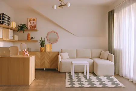 Stylowe wnętrze salonu w boho i minimalistycznym stylu z jasnymi meblami.