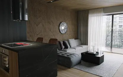 Nowoczesny salon z szarymi meblami, czarną wyspą i drewnianymi akcentami.