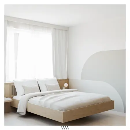 Wnętrze sypialni w stylu japandi z minimalistycznym łóżkiem i nowoczesnymi detalami.