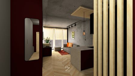 Wnętrze industrialne z minimalistycznym wystrojem, szare ściany, drewniane akcenty.