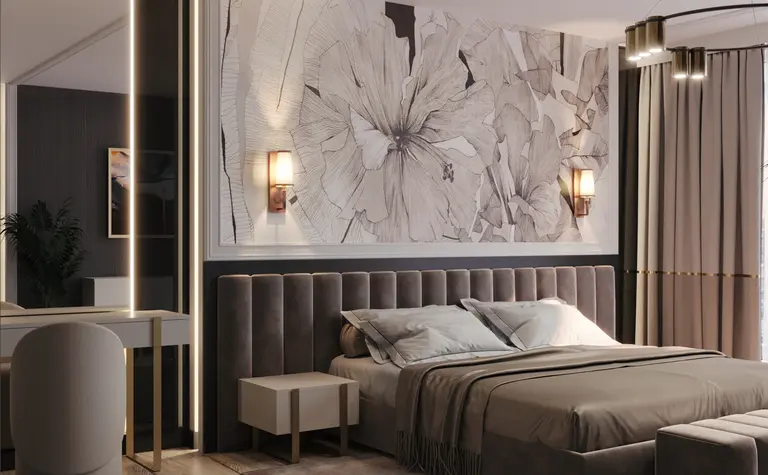 Wnętrze sypialni w stylu art deco i glamour z szarym łóżkiem oraz dekoracyjnymi roślinami.