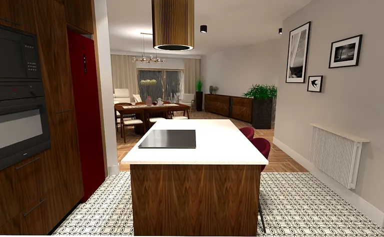 Wnętrze kuchni z drewnianą wyspą, czerwoną lodówką i eklektycznymi akcentami.