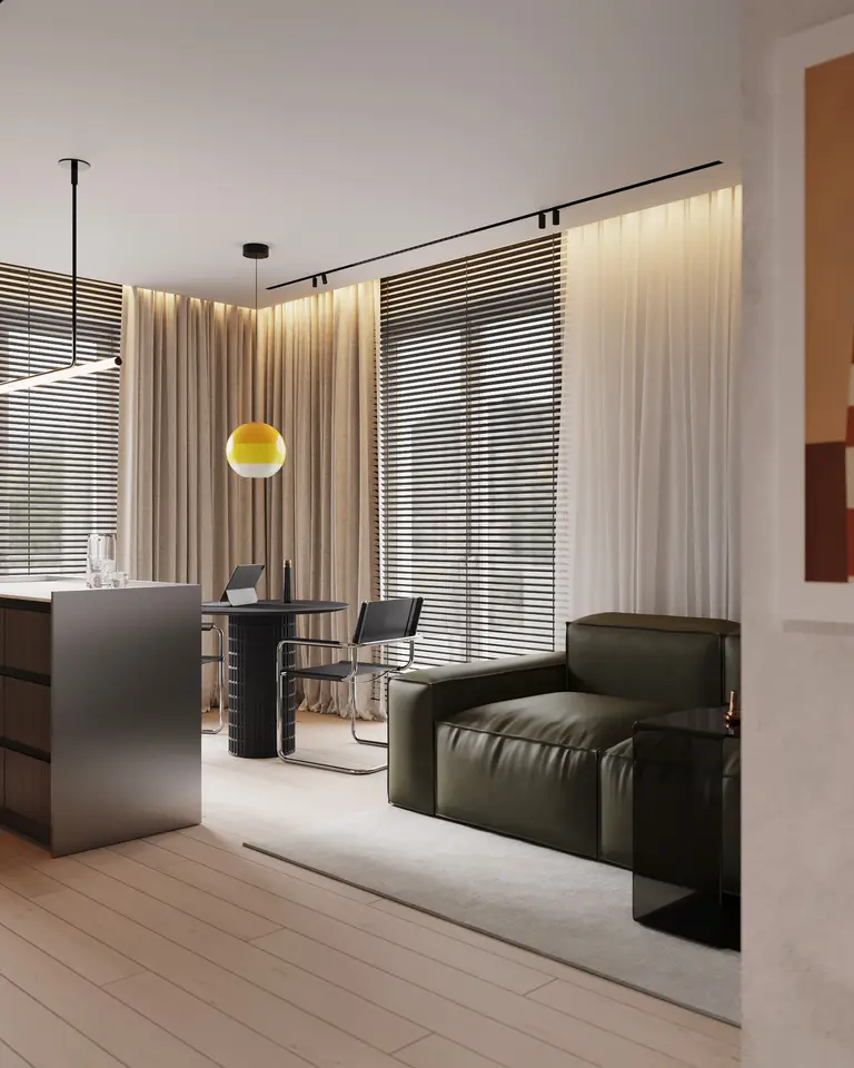 Minimalistyczne wnętrze z zieloną sofą, jasnym stołem i zasłonami.
