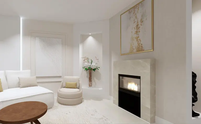 Wnętrze salonu z białymi meblami, kominkiem i roślinnością.