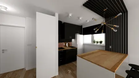 Wnętrze kuchni w stylu minimalistycznym z czarnymi meblami, drewnianym blatem i nowoczesnym oświetleniem.