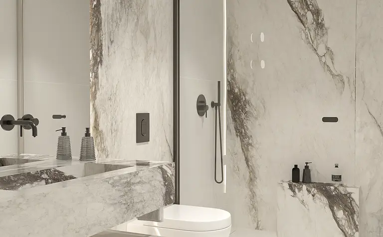 Wnętrze nowoczesnej łazienki z marmurowymi ścianami i minimalistycznym wystrojem