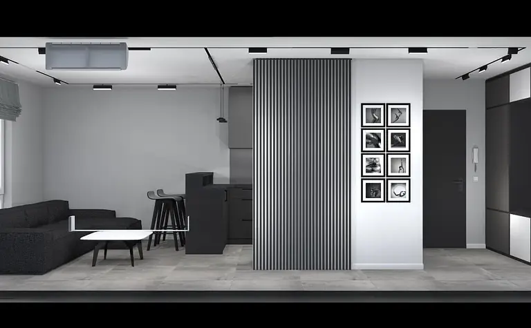 Wnętrze salonu z czarną sofą, szarymi ścianami i nowoczesnymi elementami art deco i minimalistycznymi.