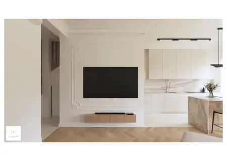 Wnętrze kuchni w stylu minimalistycznym z białymi meblami i drewnianymi detalami.