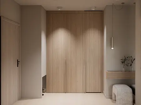 Nowoczesny przedpokój z drewnianymi szafkami, minimalistycznym oświetleniem, w stylu japandi.
