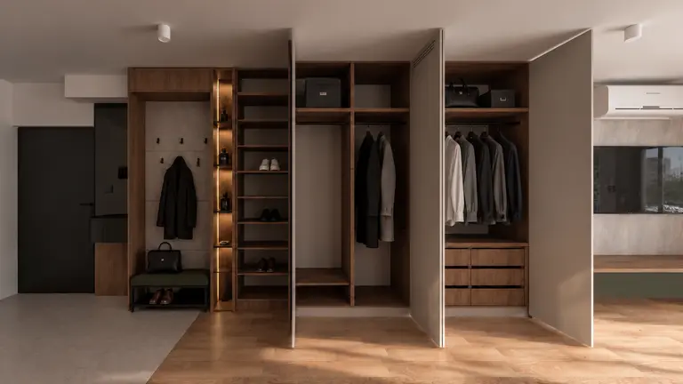 Wnętrze garderoby w stylu japandi, minimalistycznym i quiet luxury z drewnianymi akcentami.
