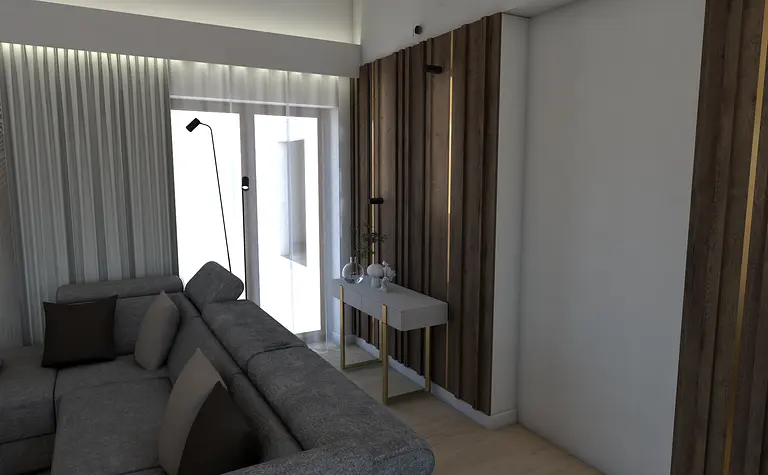 Wnętrze nowoczesnego salonu z szaro-brązową sofą i białymi detalami.