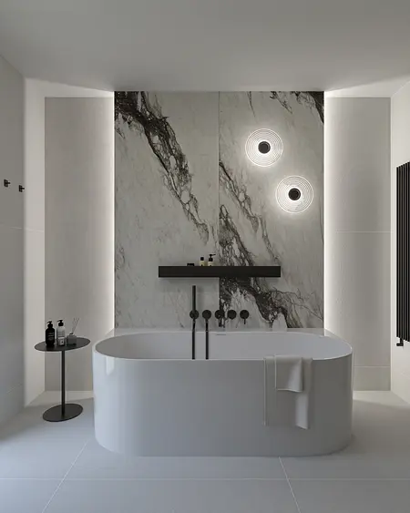 Nowoczesna łazienka z minimalistycznym designem, białą wanną i marmurową ścianą.