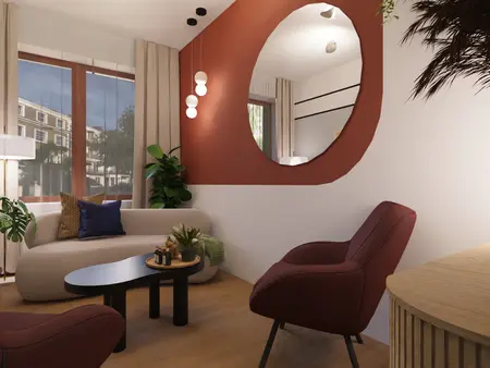 Wnętrze salonu z brązowymi akcentami, roślinami i nowoczesnym oświetleniem w stylu dopamine decor.